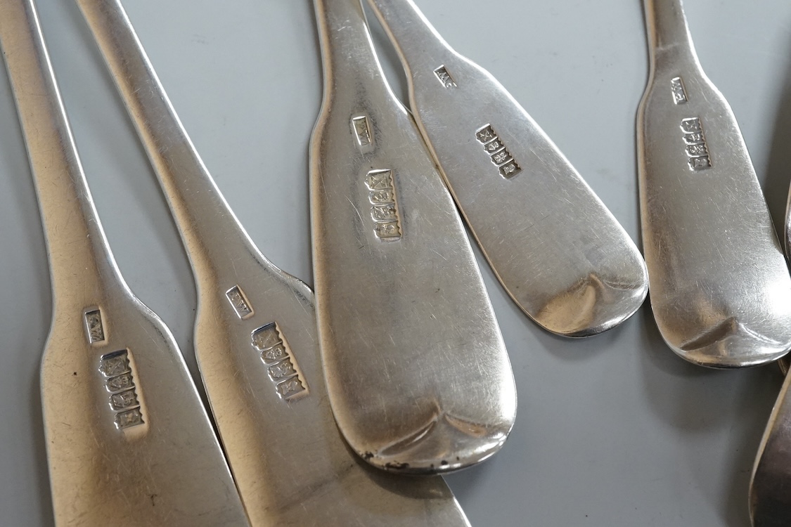 A set of six late George III Irish silver fiddle pattern table spoons and six matching dessert spoons, Philip Weekes, Dublin, 1818, 20.6oz.